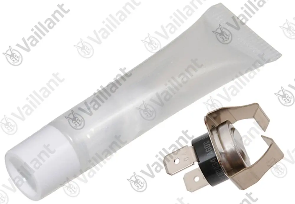 Vaillant Sicherheitstemperaturbegrenzer, bestehend aus einem Metallgehäuse mit zwei Anschlusspins und einer Tubenpackung, möglicherweise für Montage oder Wartung.